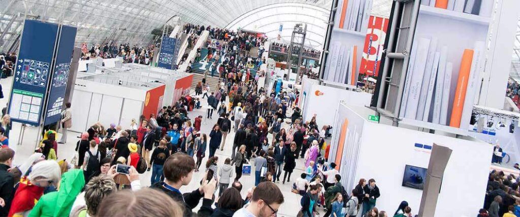 View of a crowded trade show floor from high angle